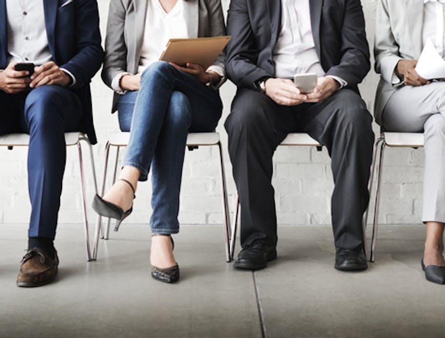 Employees sitting on chairs