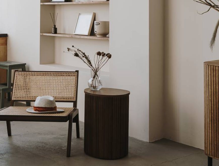 interior design indoors corner table furniture plant wood hat potted plant bench
