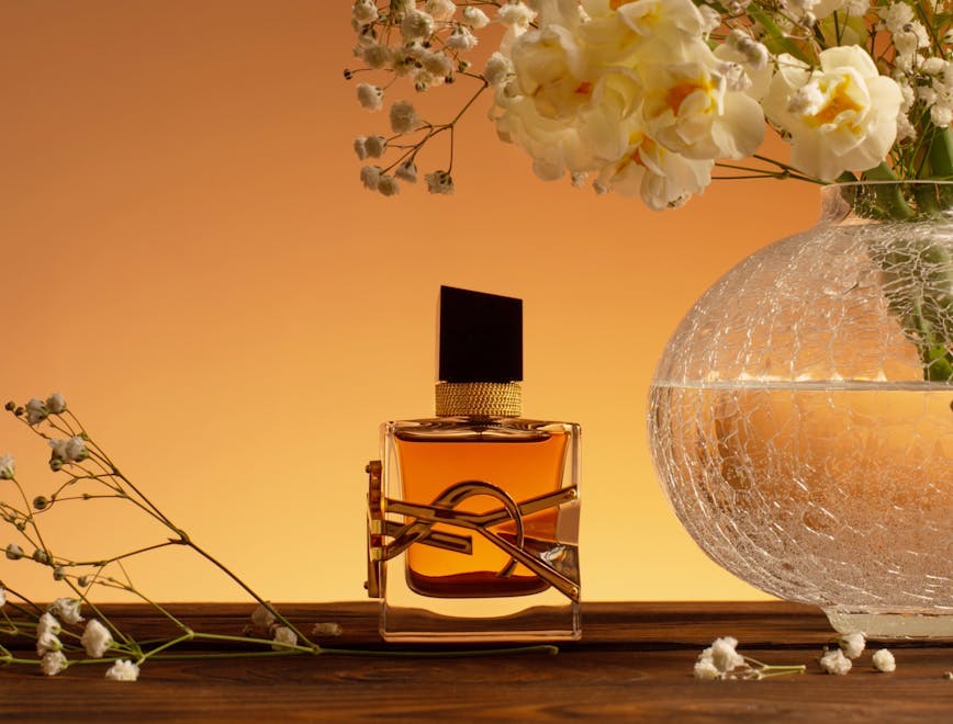 container,fragrant,beauty,illustrative editorial,vase,smell,spring,ysl perfume,ysl,parfum,golden,scent,logo,cosmetic,female,brand,intense,flowers,glass,spray,bouquet,glamour,edp,closeup,light,background,yellow,bottle,perfume,gold,gypsophila,yves saint laurent,design,libre,elegant,table,editorial,accord,designer,narcissus,fragrance,elegance,liquid,perfumery,perfume bottle,wooden,luxury,daffodils,aroma,fashion flower flower arrangement plant bottle cosmetics perfume petal ikebana